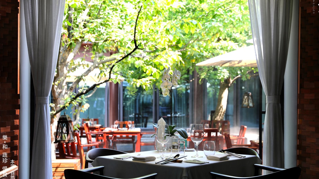 Traditional halls and cypress-lined courtyard of the Beijing Confucius Temple.