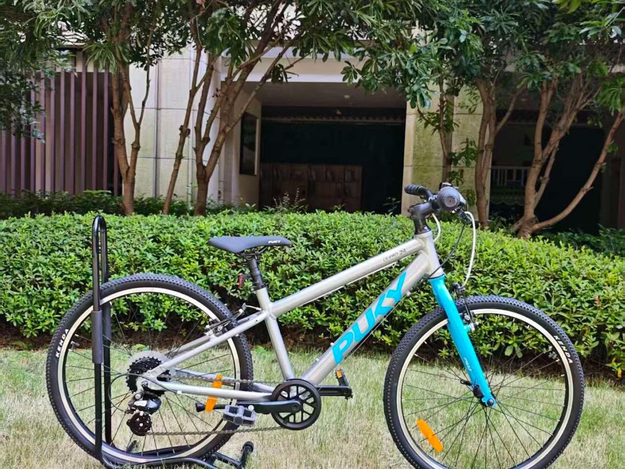 PUKY CYKE 24 Kids Bike – Blue Silver aluminium kids bike in blue, available to rent from CycleQuest China