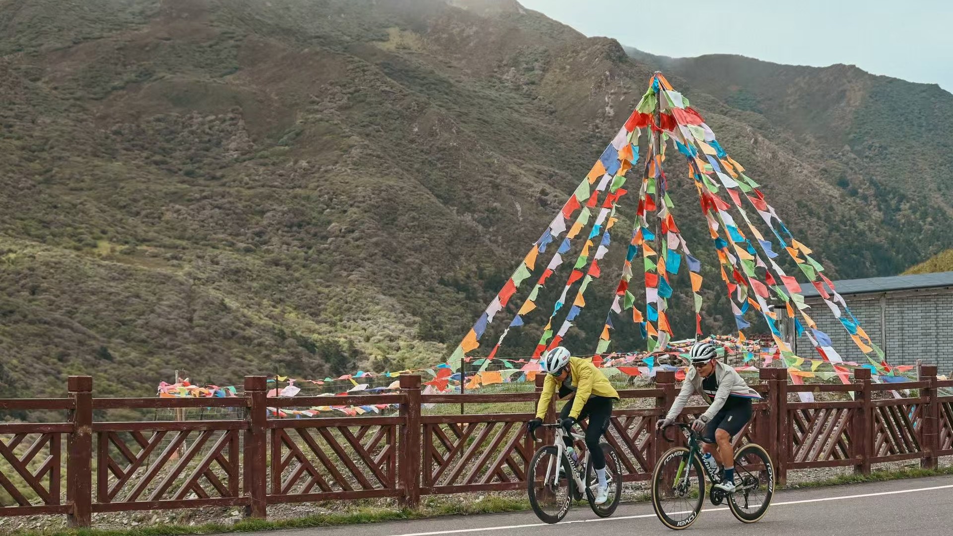 Riders on a scenic Chinese mountain road