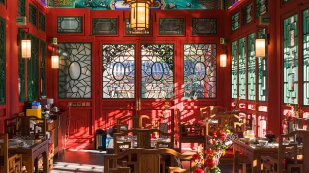Prince Kung’s Mansion. Elegant traditional Chinese tea house interior with red walls.